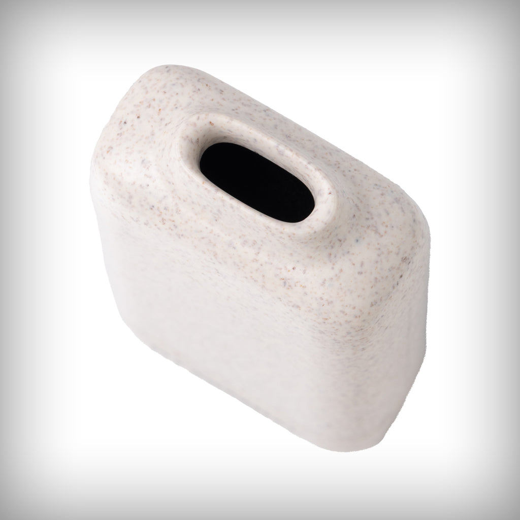 Angled close-up of the oval opening on a white MJ Arsenal Houdini exhale filter
