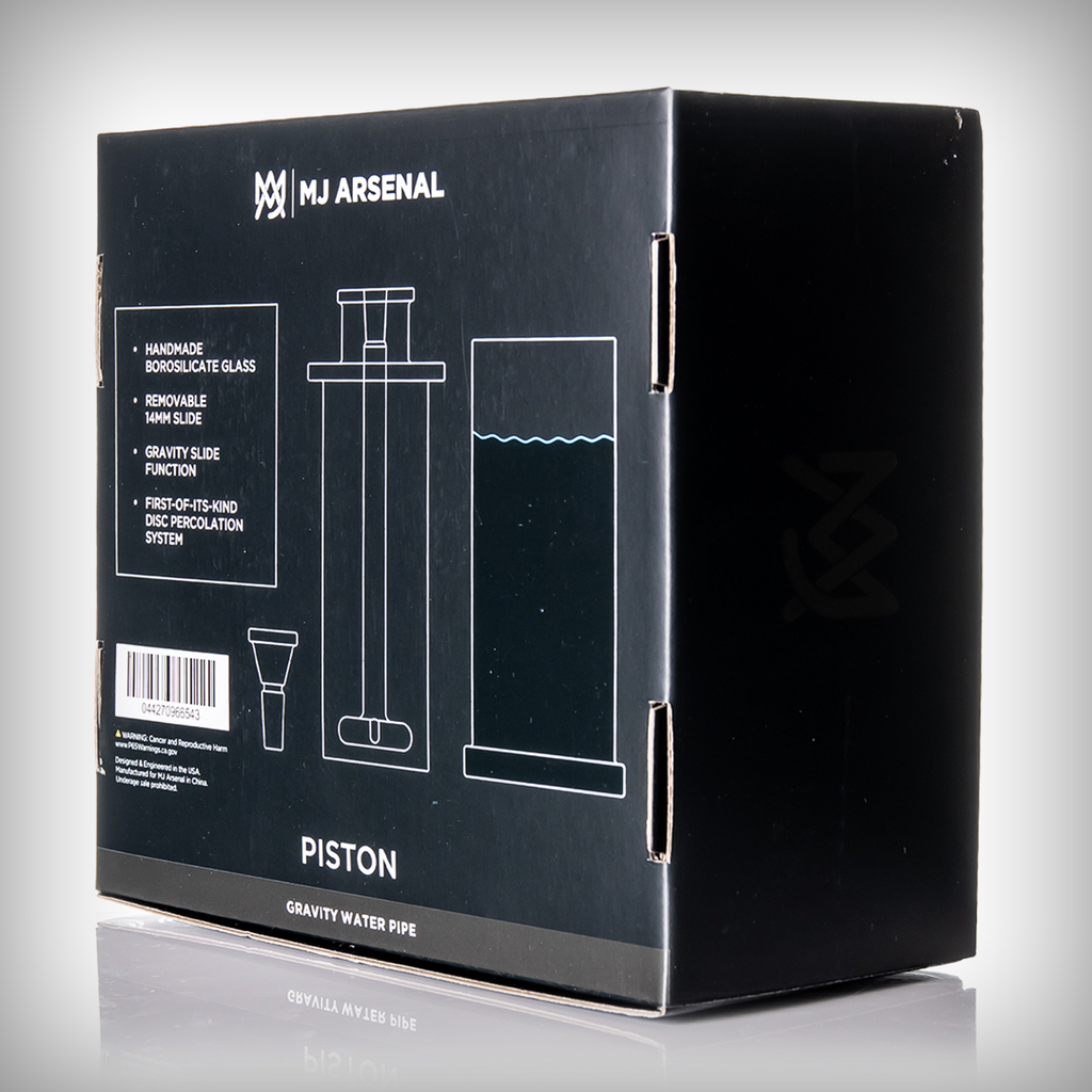 Back of the MJ Arsenal Piston Gravity Bong black retail packaging showing product diagrams and printed specifications.