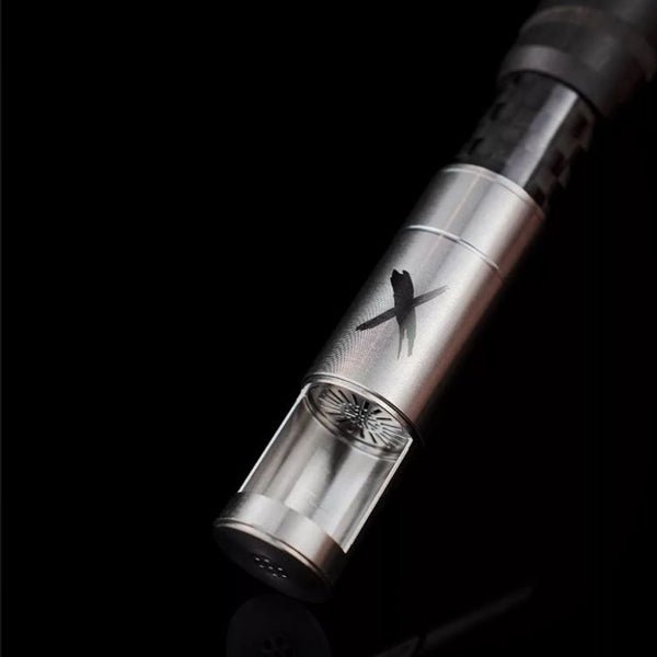 Black Pipe X analog vaporizer side profile on a dark reflective background