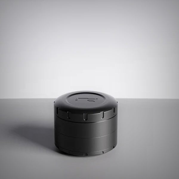 Black Tank ShredStep Grinder viewed from above with engraved lid visible