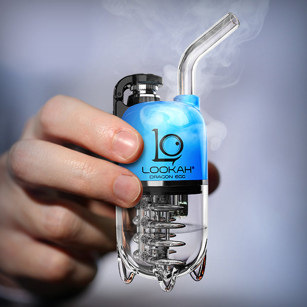 Blue LOOKAH Dragon Egg electric dab rig held in hand