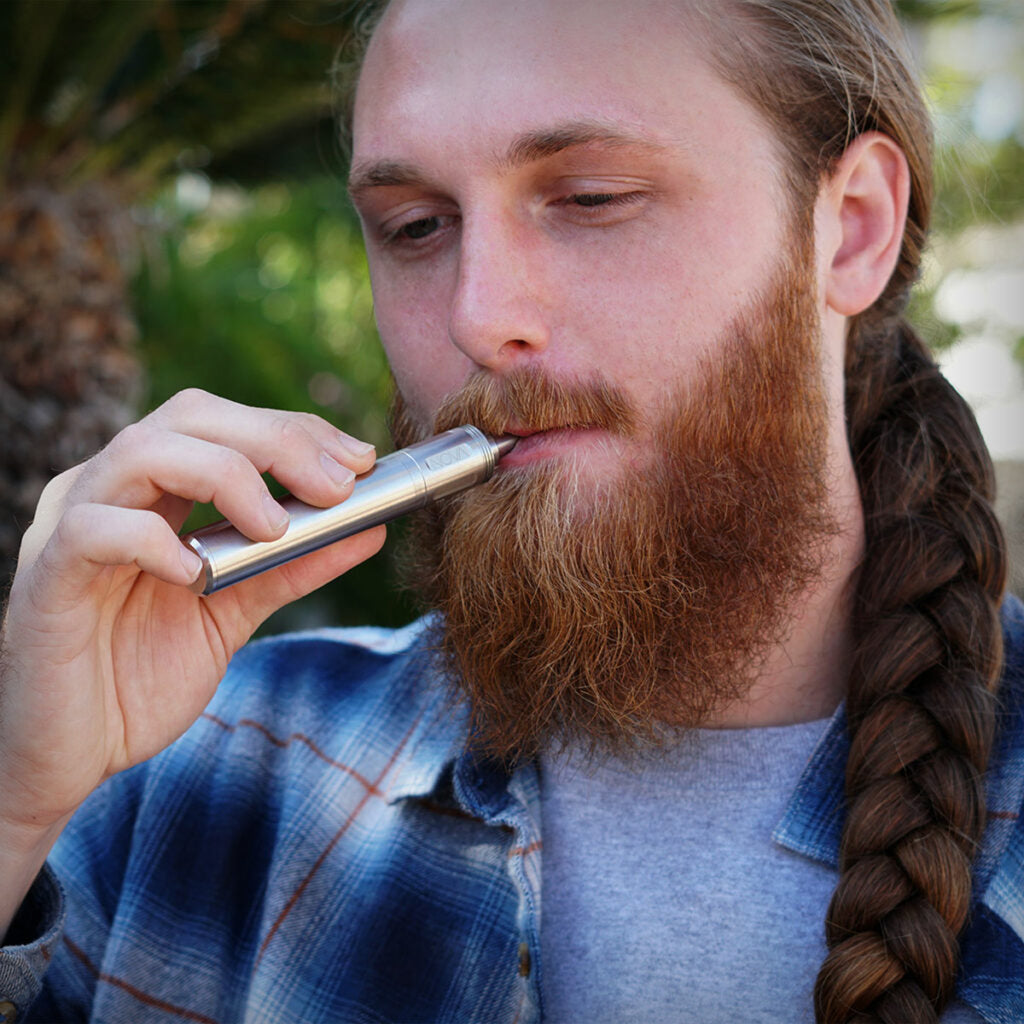 Cipher NOVA V3 Stainless Steel electric smoking pipe in use outdoors