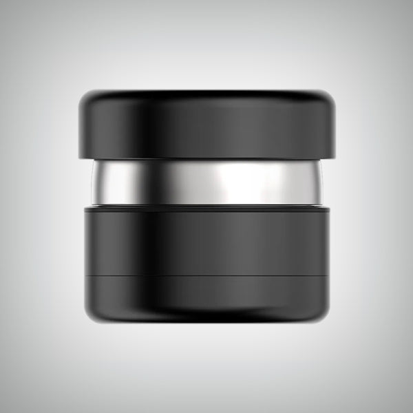 Close-up of Flower Mill herb grinder with removable pollen screen