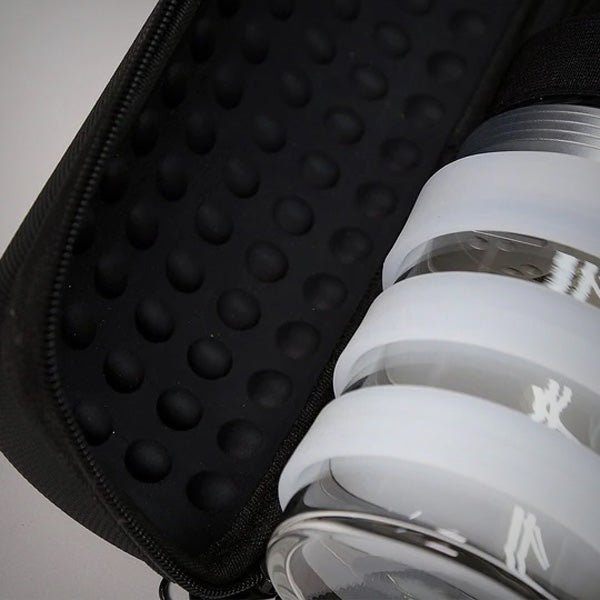 Close-up of Honest Capsule components fitted inside the padded carry case
