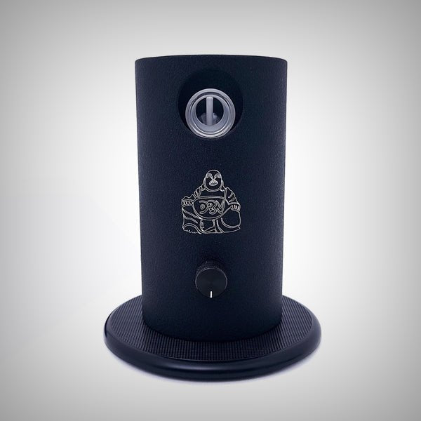 Da Buddha DBV package contents showing silver vaporizer, storage bag, tubing, glass pieces, screens, pick, and optional Aroma Top