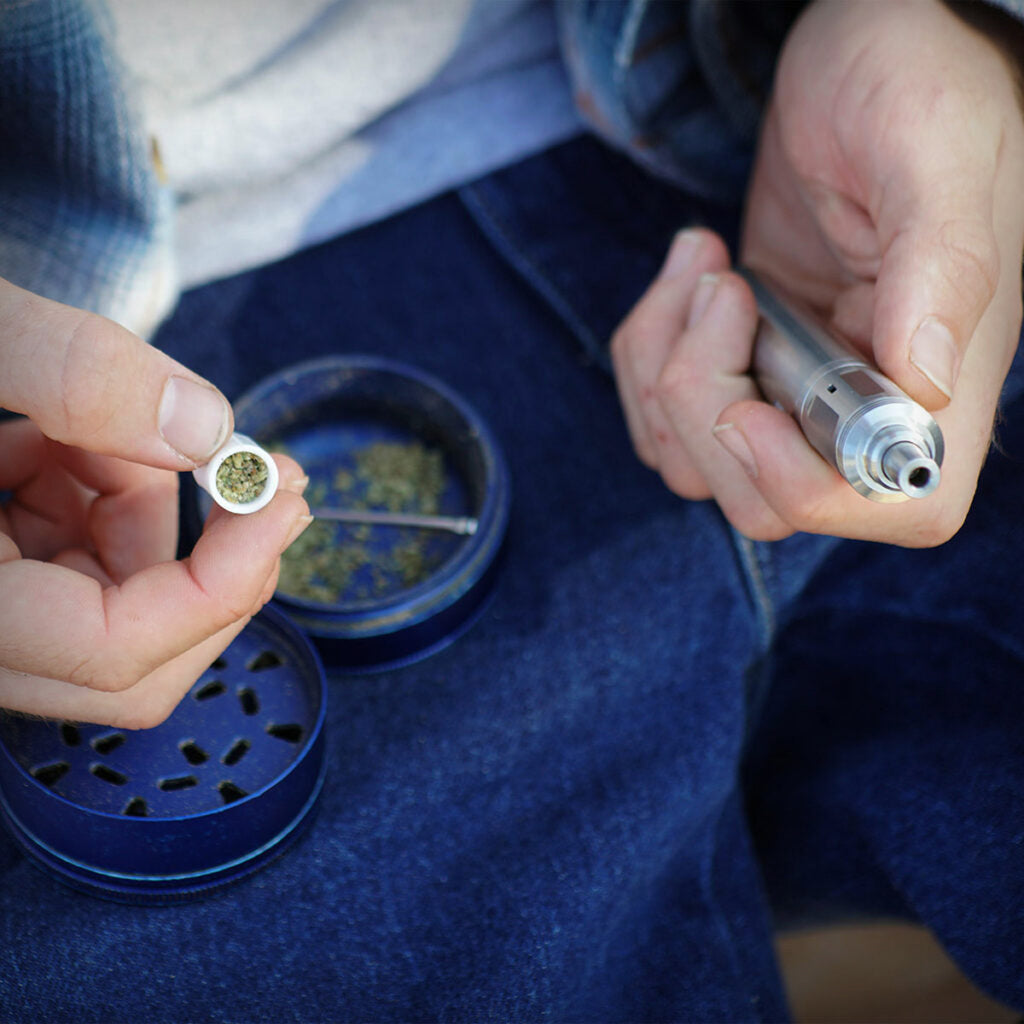 Filling a ceramic pod for the Cipher NOVA V3 electric smoking pipe