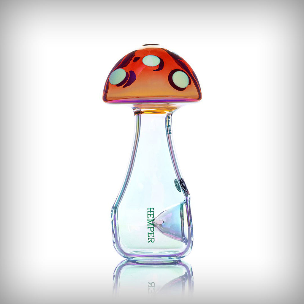 Front view of HEMPER Trippy Shroom hand pipe with mushroom face decal and circular glass bowl