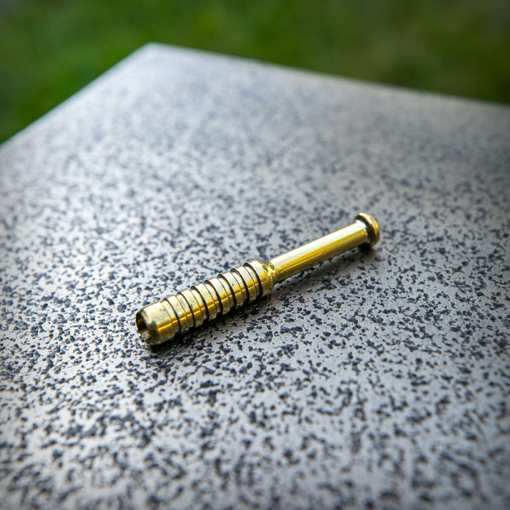 Gold metal one hitter pipe by The Mill