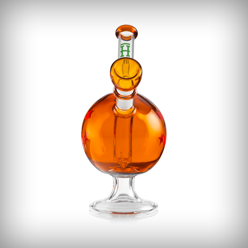 HEMPER Wish Ball water pipe straight-on rear view showing amber spherical body and clear pedestal base