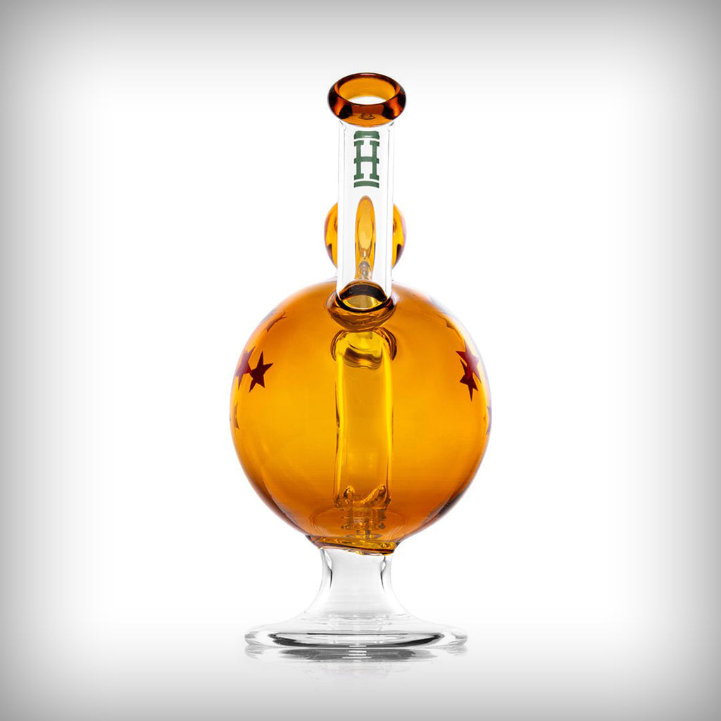 HEMPER Wish Ball water pipe straight-on view showing amber spherical body, internal diffuser, and clear base