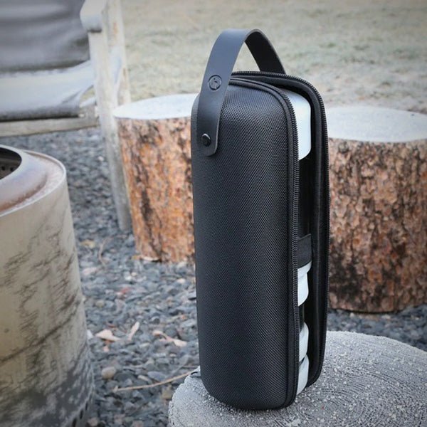 Honest Capsule Carry Case standing outdoors beside a stone surface