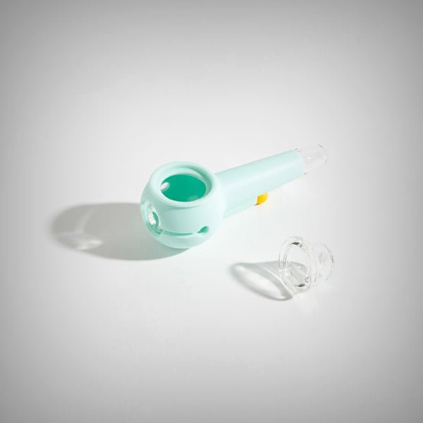 Light blue The Pipe by Weday displayed on clear acrylic blocks with cap removed