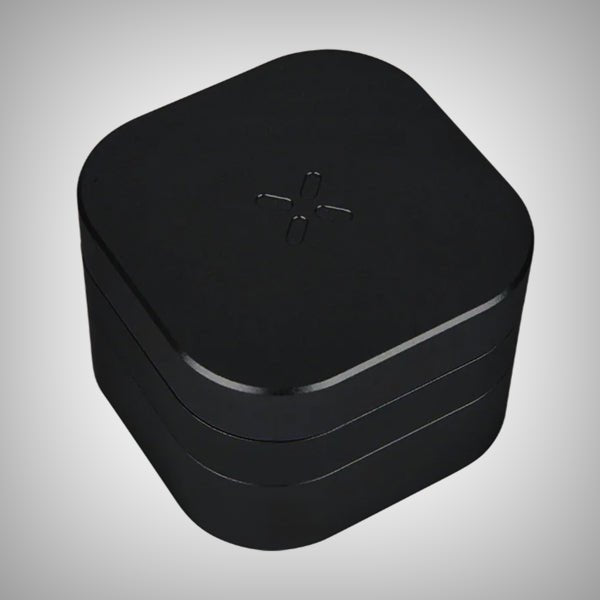 • PAX 3-piece grinder open showing teeth