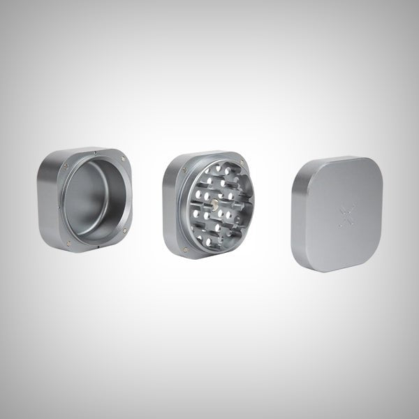 PAX herb grinder silver ergonomic design