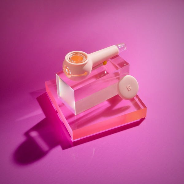 Pink The Pipe by Weday displayed on clear acrylic blocks with cap removed
