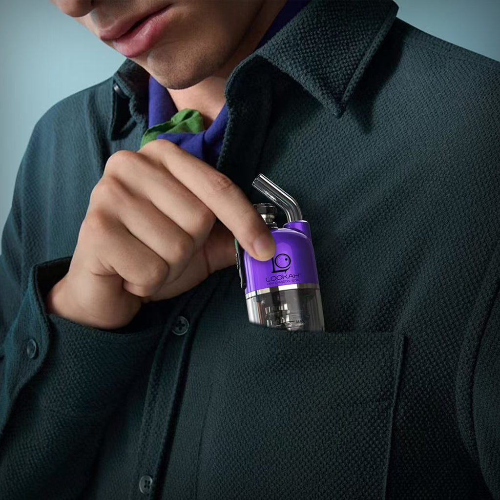 Purple LOOKAH Dragon Egg electric dab rig held in hand