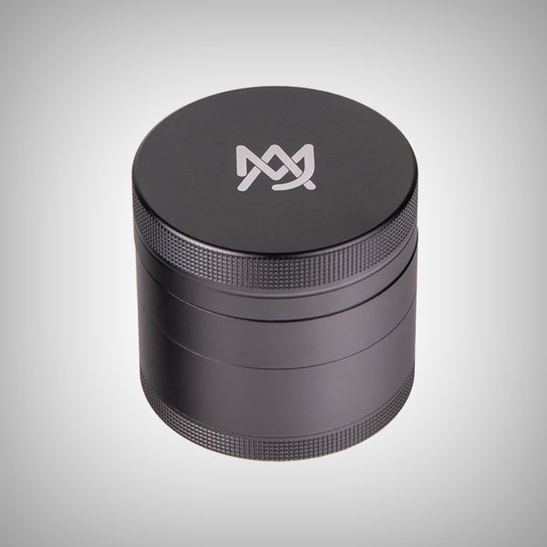 Purple aluminum grinder with diamond-cut teeth