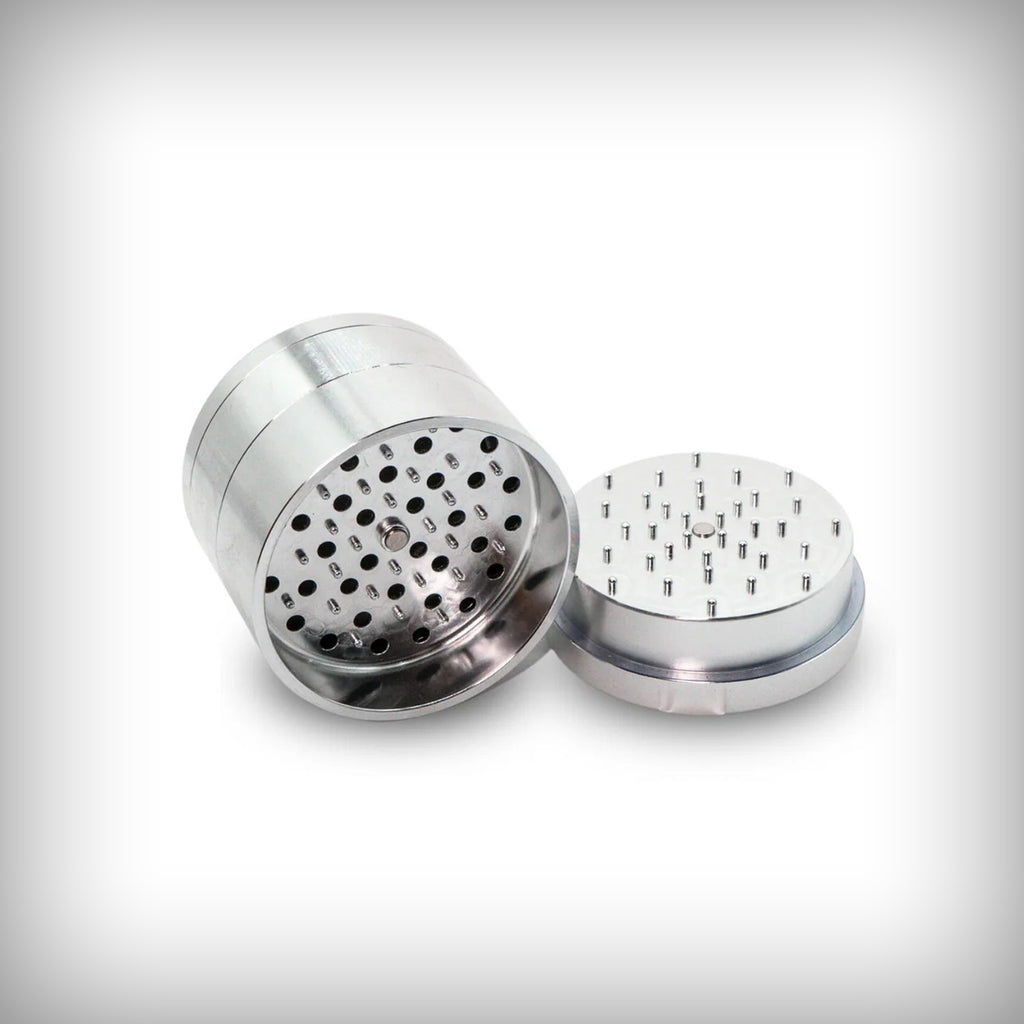 Silver Stache Grynder open to show the micro-rounded grinding teeth