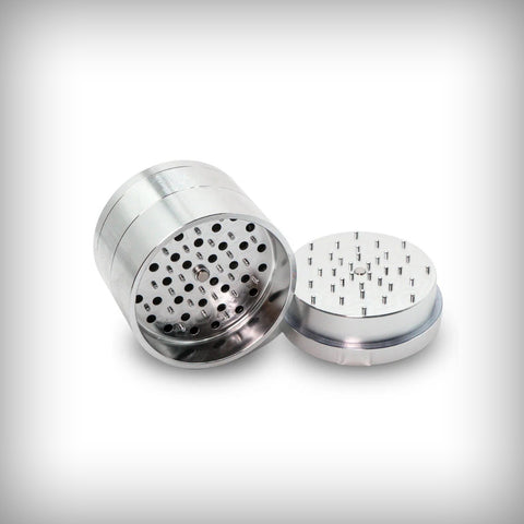 Silver Stache Grynder open to show the micro-rounded grinding teeth