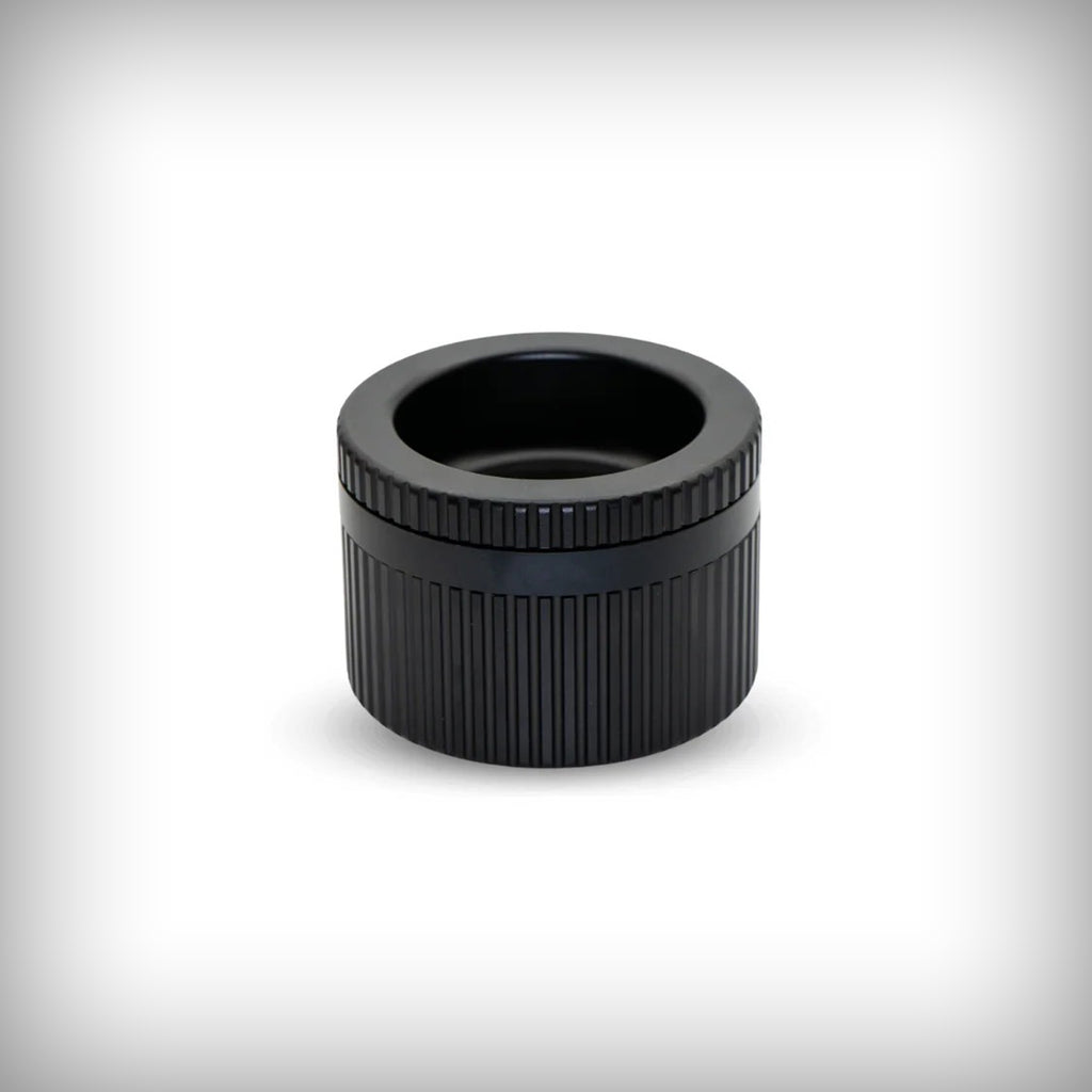 Stache Grynder 360 black aluminum grinder shown closed