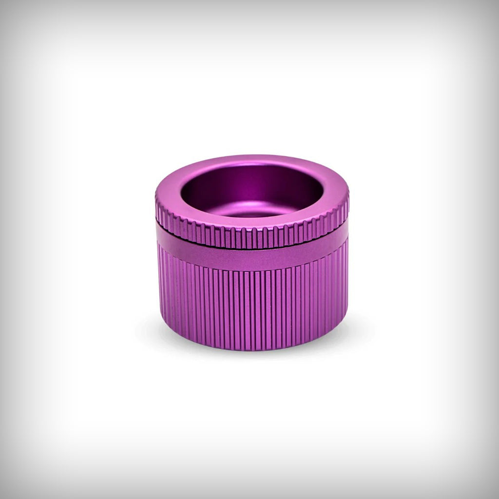 Stache Grynder 360 purple grinder shown from an angled view
