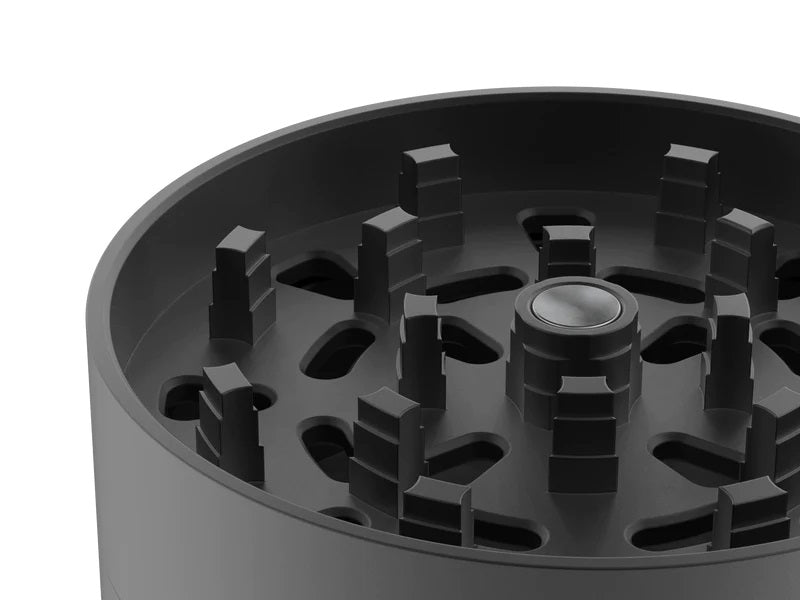 Tank ShredStep Grinder in black shown open with grinding teeth visible