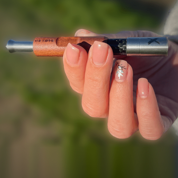 Two Brown Rosewood Pipe X analog vaporizers shown side by side