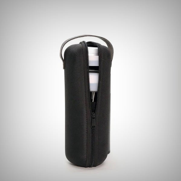 Upright Honest Capsule Carry Case with zipper opening visible