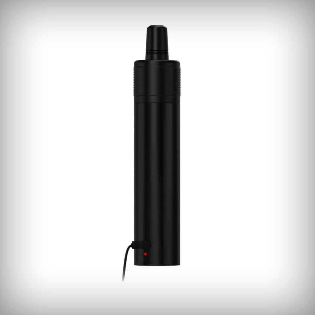 VIVANT VLeaF vaporizer standing upright with charging cable connected