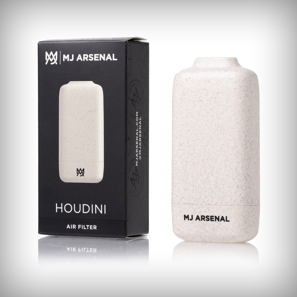 White MJ Arsenal Houdini Bio smoke filter displayed beside its black retail box