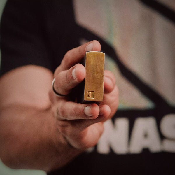 Wooden dugout pipe with solid brass bat
