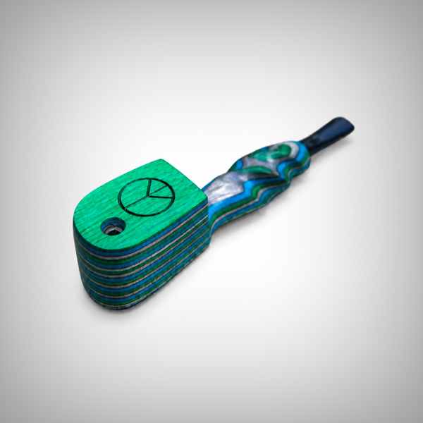 Compact wooden smoking pipe with laser-engraved peace sign cap