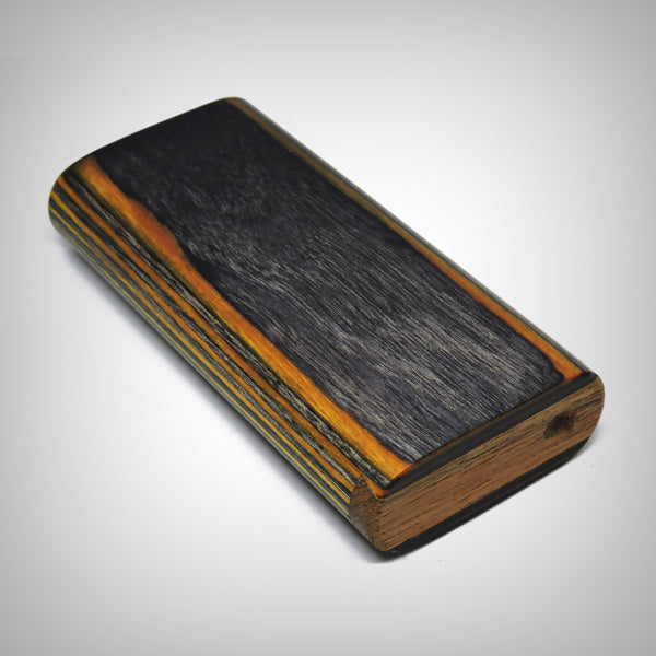 The Mill wooden dugout closed, showing the wood-grain face and striped sides