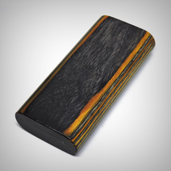 The Mill wood dugout with sliding top open and cigarette-style one hitter partially stored inside
